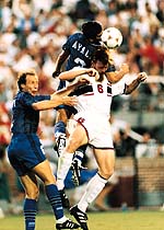 Alexi Lalas in a heading duel.